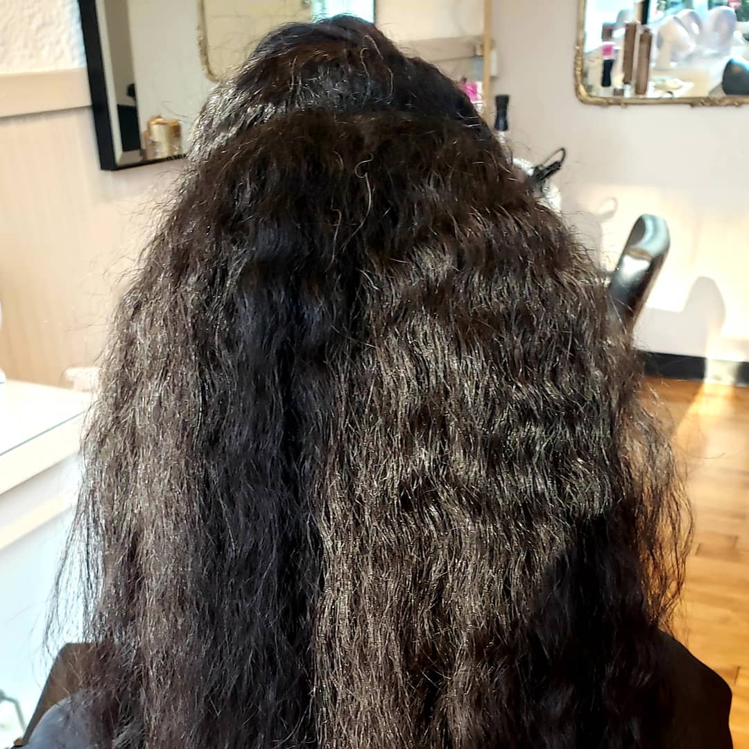 Before smoothing treatment — curly hair with frizz