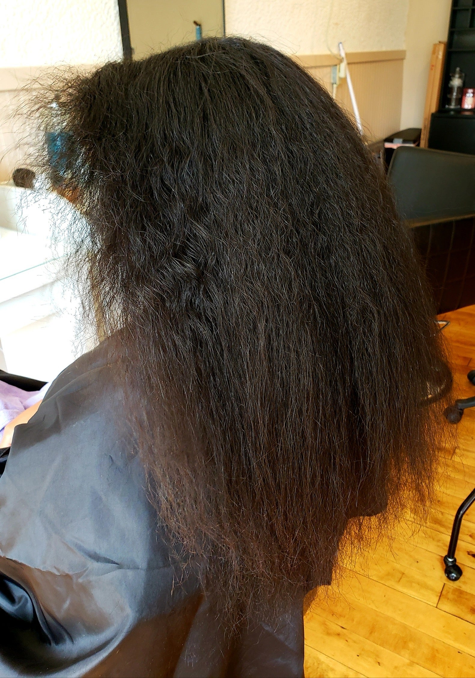 Before smoothing treatment — long frizzy hair