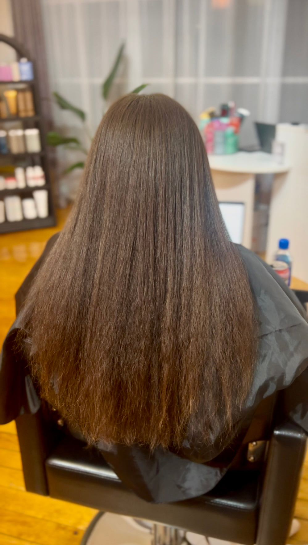 Before smoothing treatment — curly hair with frizz at Quincy MA salon